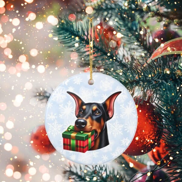 Doberman Gift Giver Ceramic Ornament – Holiday Charm with Snowflake Background - Image 5