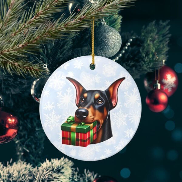 Doberman Gift Giver Ceramic Ornament – Holiday Charm with Snowflake Background - Image 6